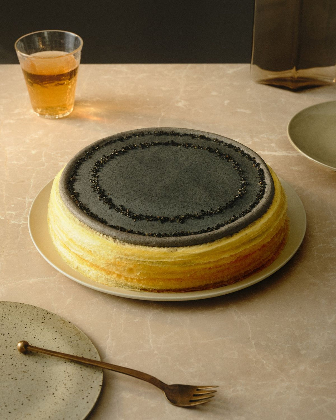 Black sesame crepe cake with layered crepes and roasted black sesame cream — Bamboo Green Florist Penang