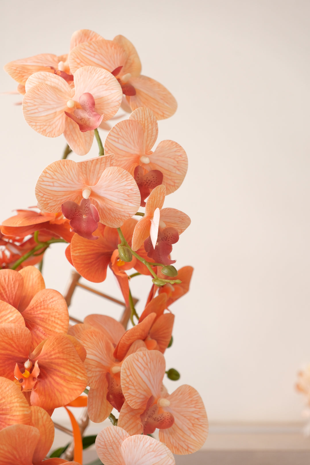 Elegant artificial orchid décor symbolizing prosperity and growth