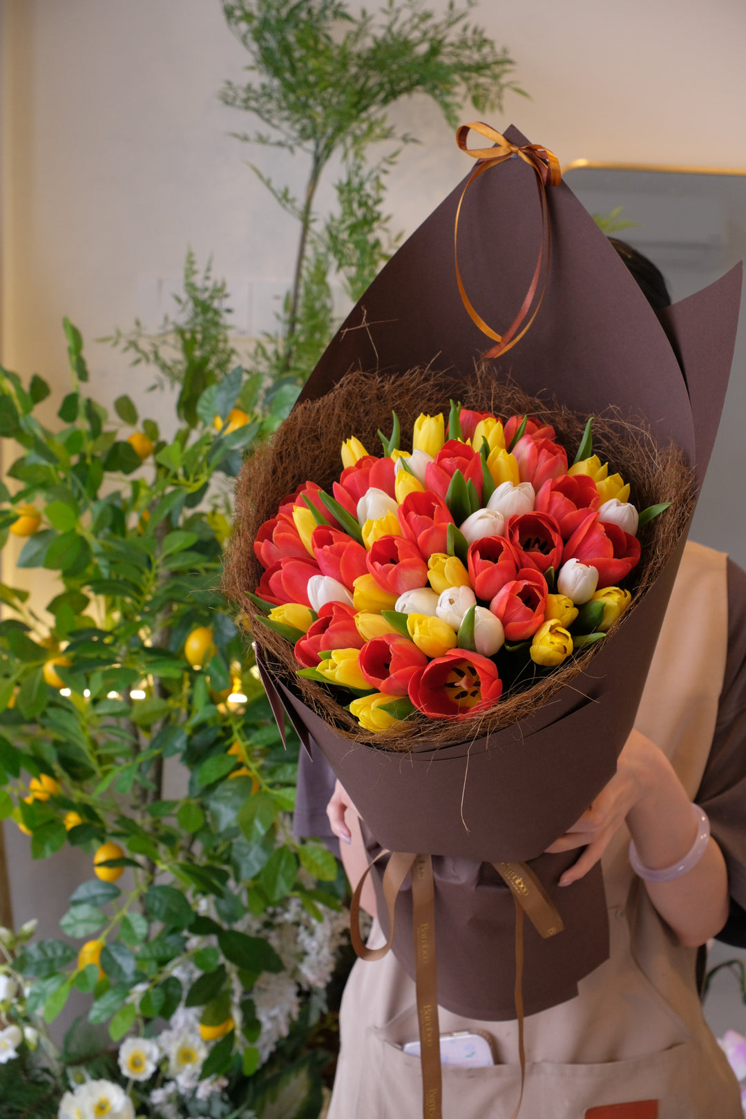 50 stalks assorted fresh tulips Mother's Day orchid arrangement . The ultimate gift from Bamboo Green Florist, best florist in Penang.