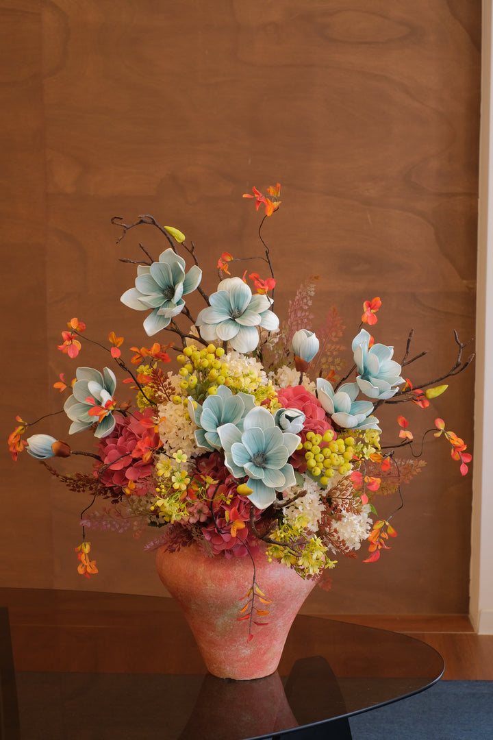 Artificial blue magnolia paired with colourful florals in Lunar Ode 明月繁星