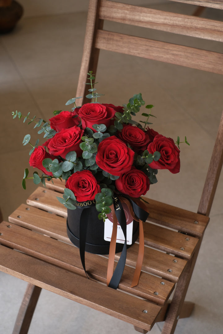 12 luxurious red roses in an elegant black box – the perfect Valentine's Day gift. Order online from Bamboo Green Florist, a trusted Penang florist with delivery