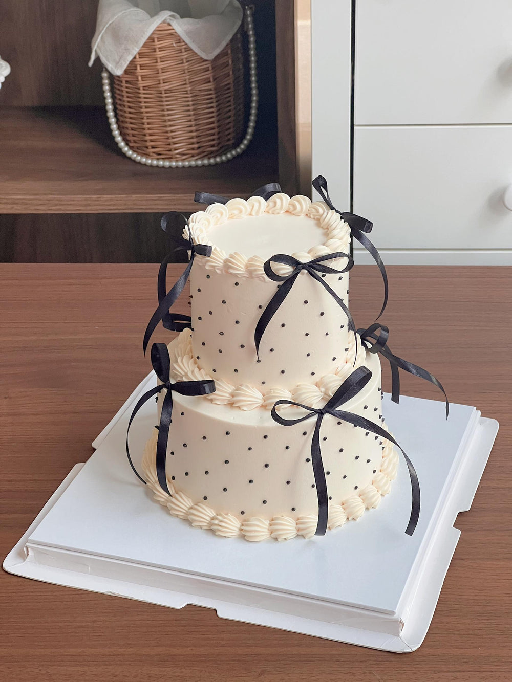Black and white fresh cream celebration cake with shell piping and ribbon detail, Bukit Mertajam
