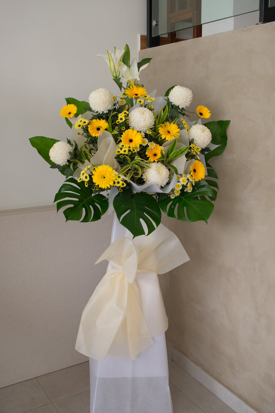 condolences flowers with lilies delivery in penang