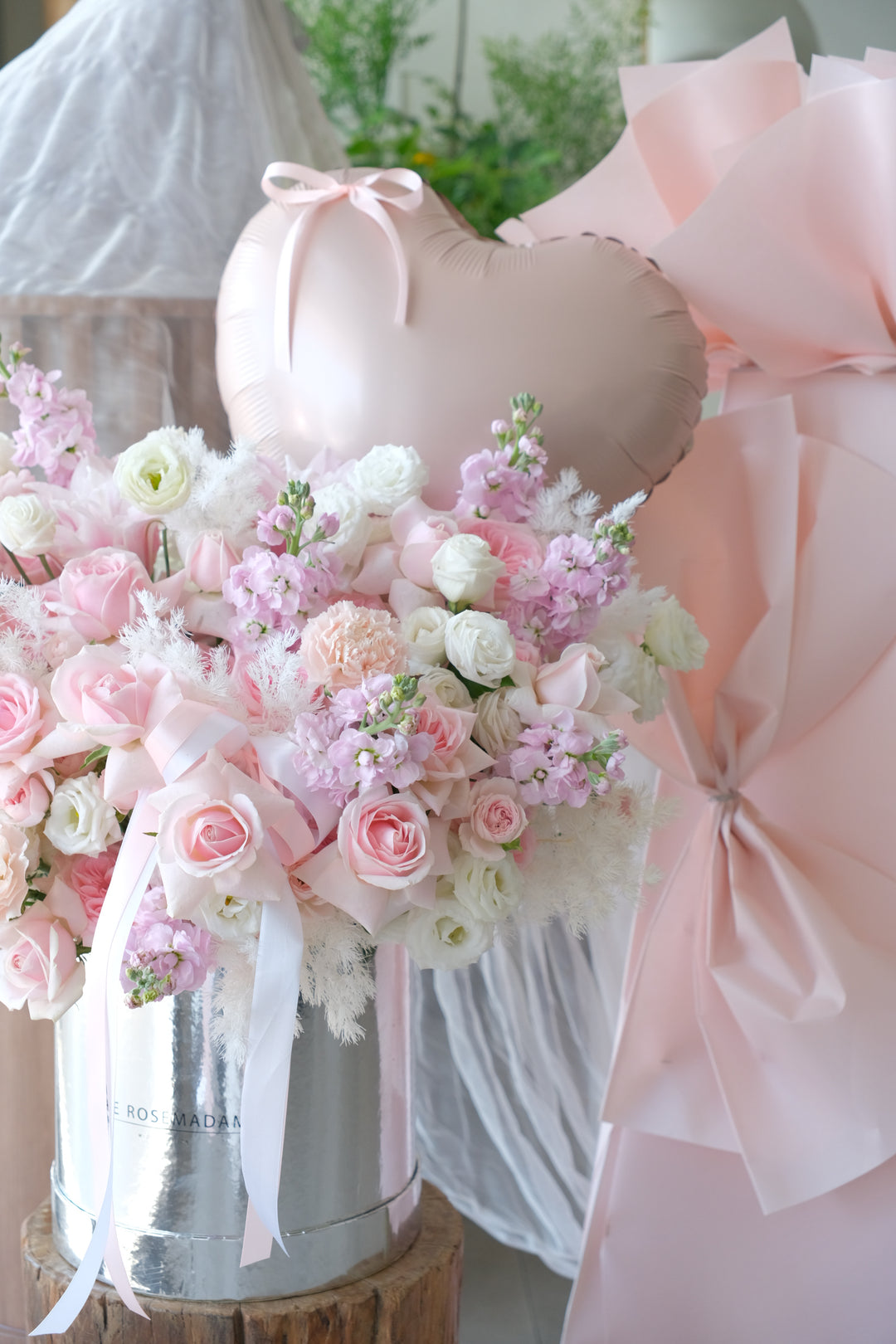 Venetian flower box styled with a heart balloon add-on, a luxe romance gift delivered across Penang.
