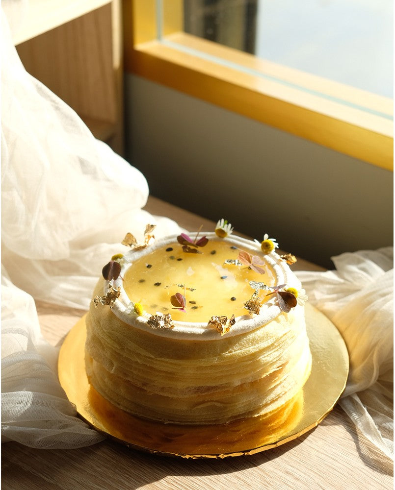 Did someone say Mango Passion? Yes, we heard you! So we came up with this easy-on-the-eye and delicious-in-the-tummy Mango Passion fruit crepe cake. Cake delivery in Penang.