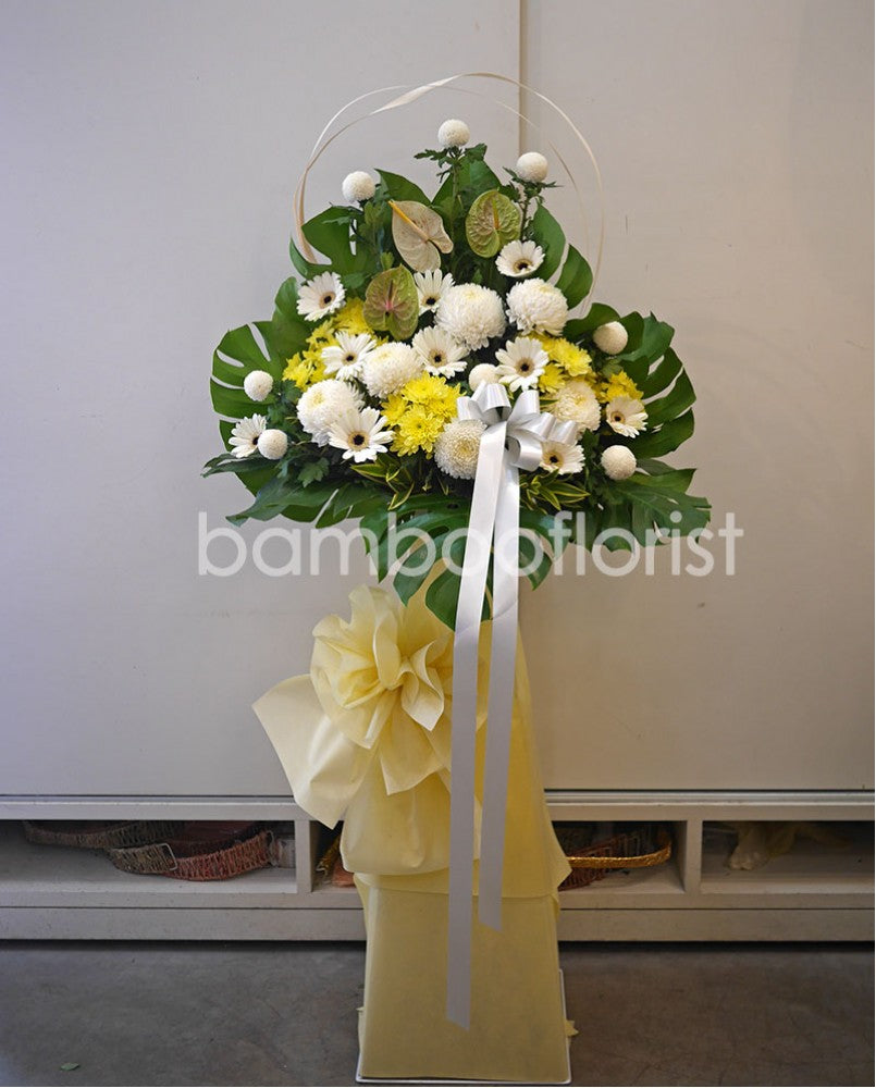 Express your warmest sentiments with this standing wreath, whilst its pastel hues of flowers will lovingly grace the service. For same day condolences flowers delivery in Butterworth.