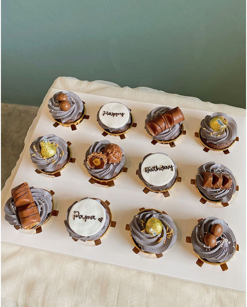 Chocolate is happiness that you can eat. Chocolate flavour cupcakes topped with variety of chocolates. Cup cake delivery in Penang.