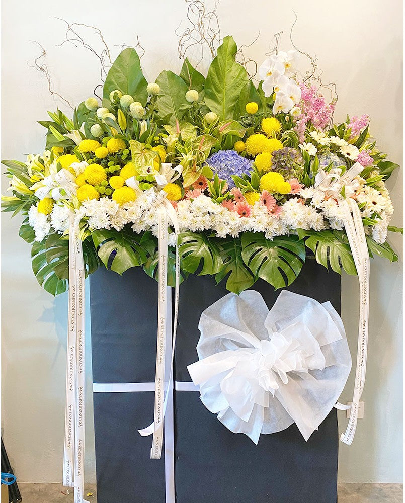 When words leave you, express your sympathy and condolence the traditional way by sending a floral tribute to honor the memory of a loved one, relative or friend. For same day condolences flowers delivery in Penang.