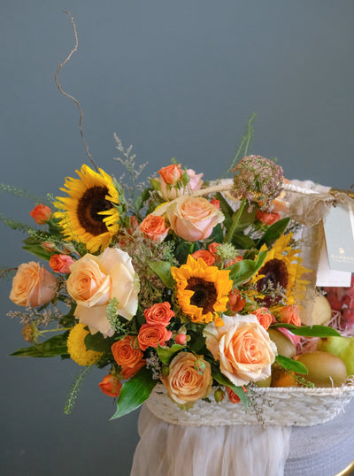 Featuring an array of juicy fruits, such as grapes, apples and oranges, this generous gift is certain to get you into their good books. Accented by a beautiful flower arrangement of sunflowers, roses, ping pongs & fillers. Same day fruit basket delivery in Penang and Butterworth.