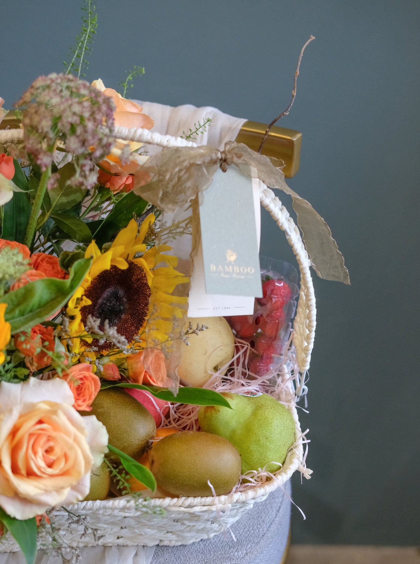 Featuring an array of juicy fruits, such as grapes, apples and oranges, this generous gift is certain to get you into their good books. Accented by a beautiful flower arrangement of sunflowers, roses, ping pongs & fillers. Same day fruit basket delivery in Penang and Butterworth.
