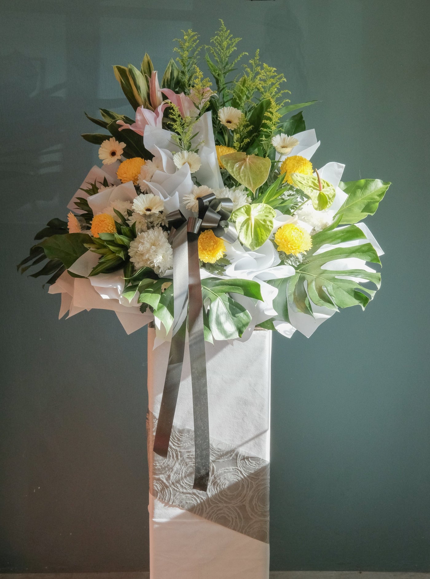 Live on so as to preserve the memories that were rightfully ours. For same day condolences flowers delivery in Butterworth.