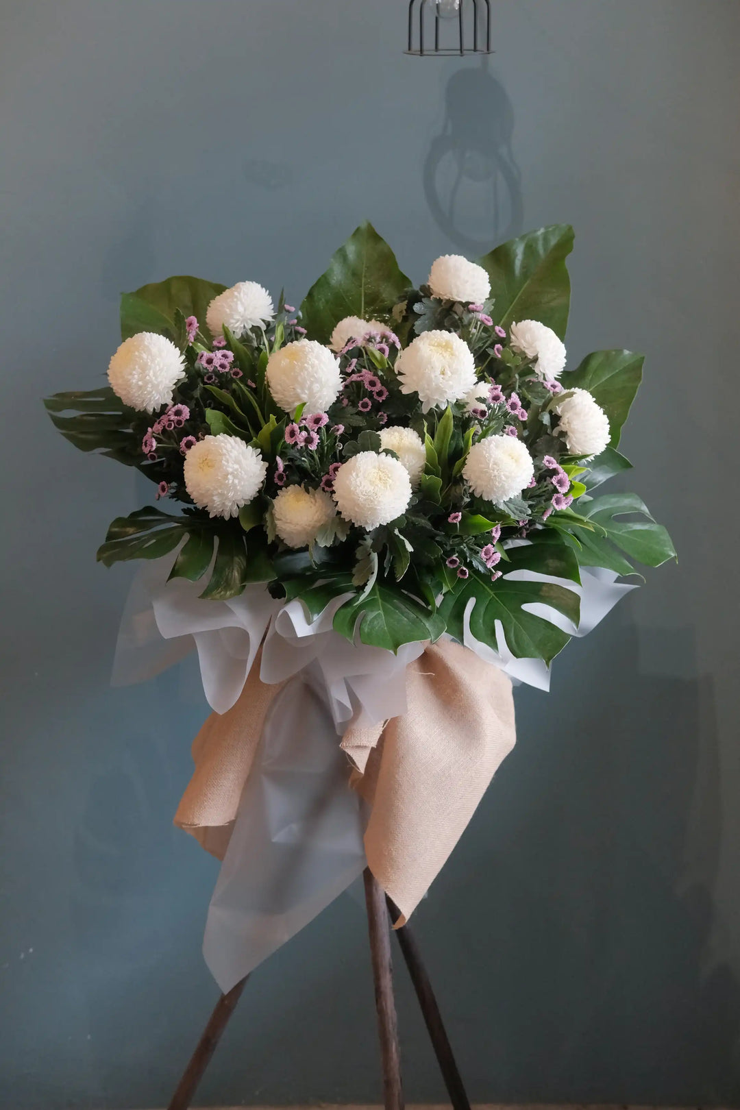 Featuring the freshest flowers to honour the deceased and shine to lift spirits up. For same day condolences flowers delivery in Penang.