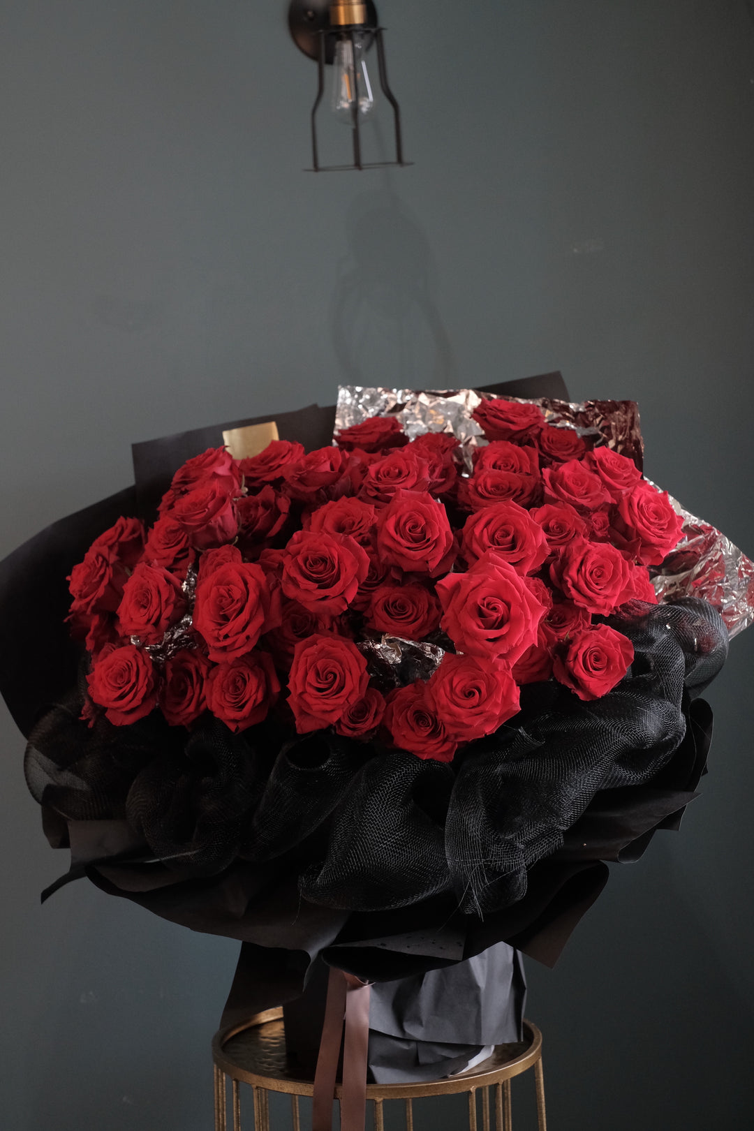 Make a strong statement with this 99 stalks of d lux Premium red roses for your valentine's day bouquet