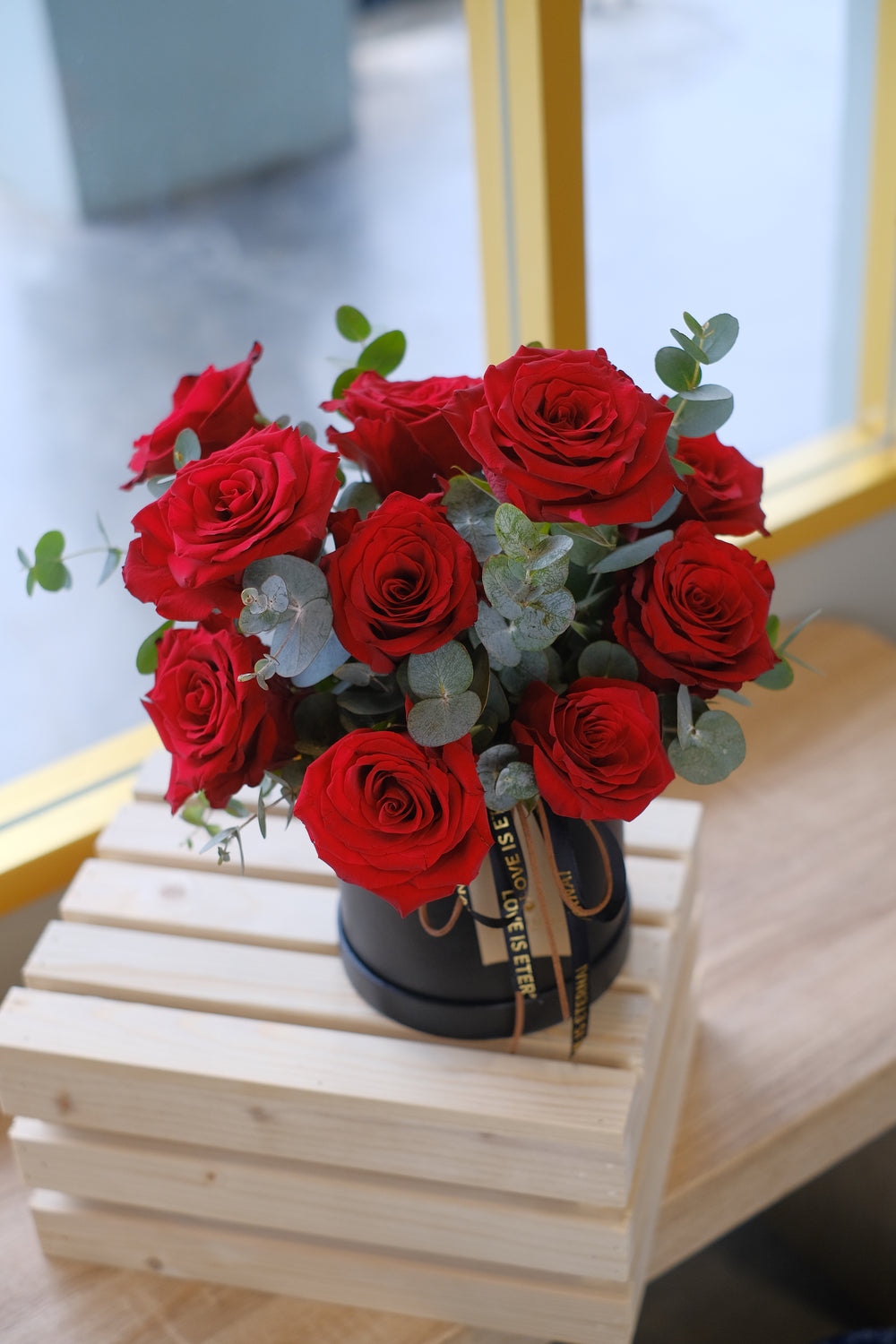 12 luxurious red roses in an elegant black box – the perfect Valentine's Day gift. Order online from Bamboo Green Florist, a trusted Penang florist with delivery