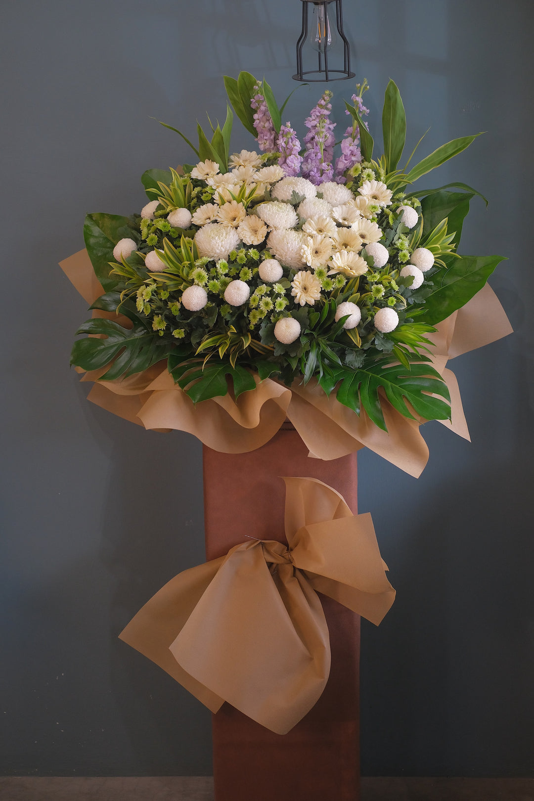 Through this soothing arrangement to remember the great life of the love. For same day condolences flowers delivery in Penang, Butterworth and Bukit Mertajam.