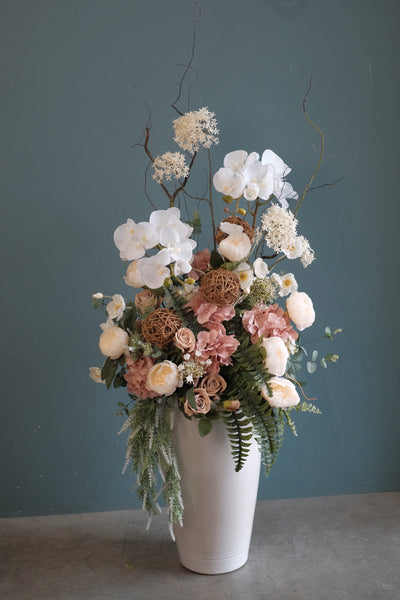 Omakase (お任せ) is a Japanese phrase that means “I’ll leave it up to you”. We’ll create something in our signature freeform, textured style with artificial flowers.  Please note that pictures are for reference purposes only and are samples of our past florist’s Omakase works. Like you, all blooms are unique and subjected to availability.