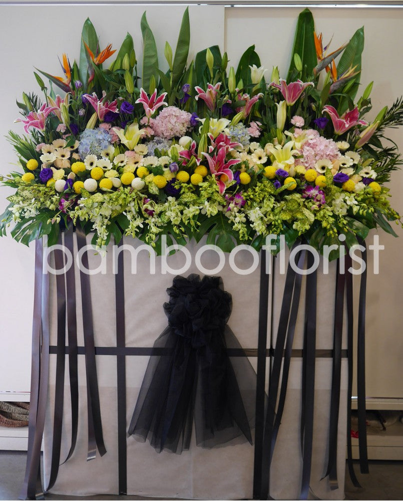 This lovely floral testament to the circle of life and love evokes beautiful memories even during the most difficult times. For same day condolences flowers delivery in Penang.  