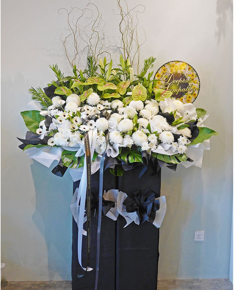 A befitting condolences floral arrangement to offer comfort for the bereaved. Condolences flower delivery in Penang, Butterworth and Bukit Mertajam.