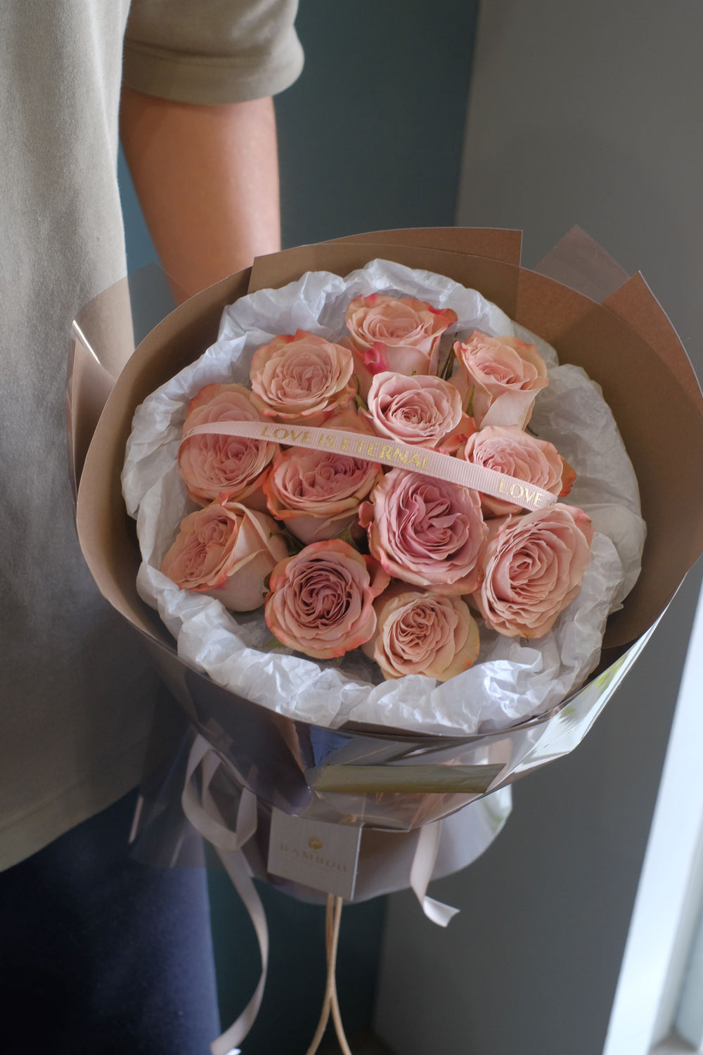 Always favorite, this 12 stalks premium cappuccino roses are sure to make a statement for every occasion. Perfect for a grand romantic gesture or surprising your sweetheart on the Valentine's Day!  Photo shown:  12 stalks 