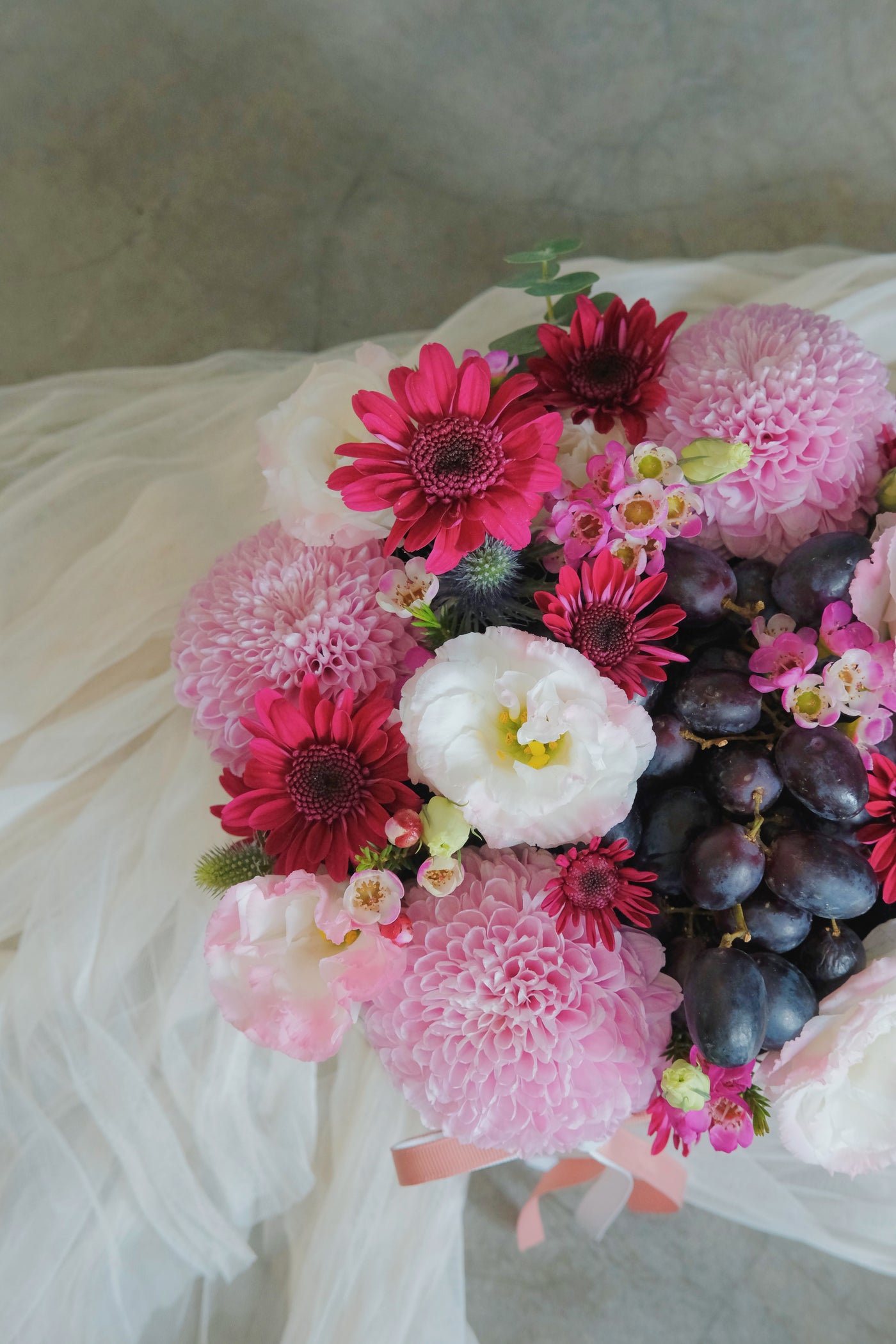 Fruit meets flowers in this delicious arrangement! Brightened by fresh blooms of our choice, this fruit gift basket is a yummy choice packed with tropical and imported fruits. Same day fruit basket delivery in Penang and Butterworth.