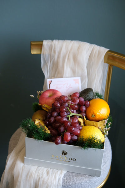 Enjoy an instant health kick with our choice of 5 a day fruits, here’s our pick of the best.  Lemon x 1  Avocado x 2  Grapes x 1 Bunch   Kiwis x 3  Orange x 2  Apples x 2  Tobelerone x 3 (or other mini bite-sized chocolates)  fresh flowers & foliages adornment. Same day fruit basket delivery in Penang and Butterworth