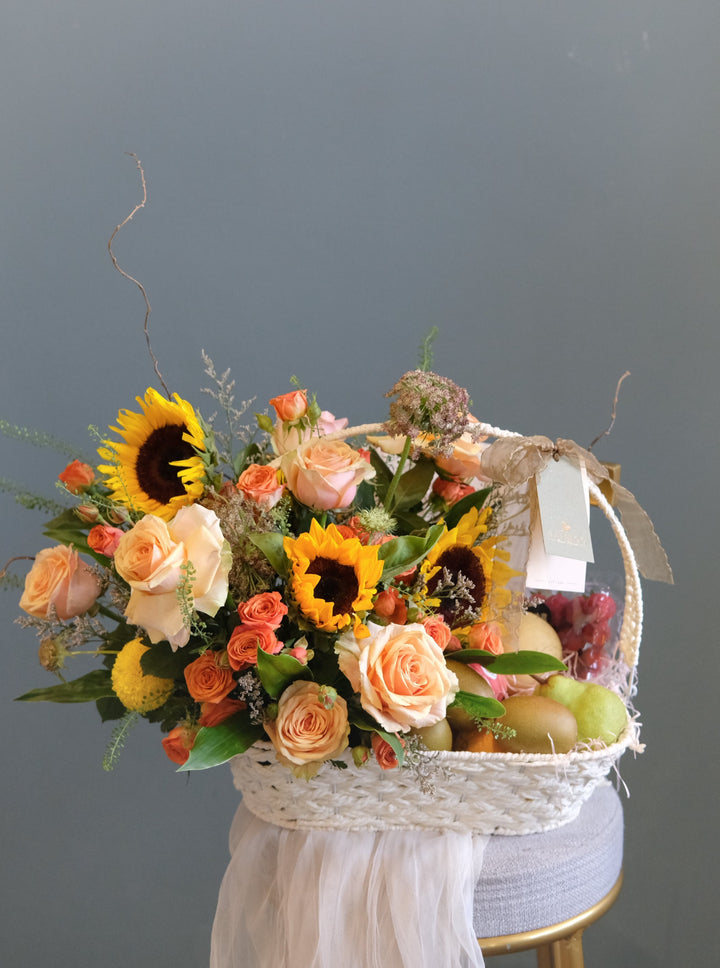 Featuring an array of juicy fruits, such as grapes, apples and oranges, this generous gift is certain to get you into their good books. Accented by a beautiful flower arrangement of sunflowers, roses, ping pongs & fillers. Same day fruit basket delivery in Penang and Butterworth.